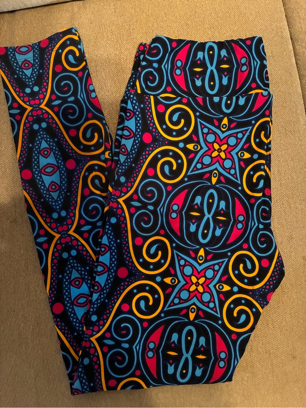 LuLaRoe Black Leggings with Multicolor Swirl & Star Pattern